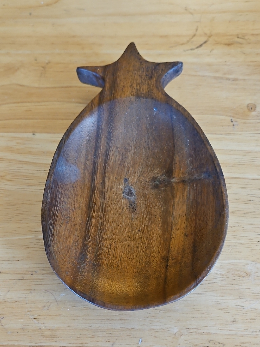 Vintage monkey pod wood carved pineapple-shaped bowl, often used for snacks